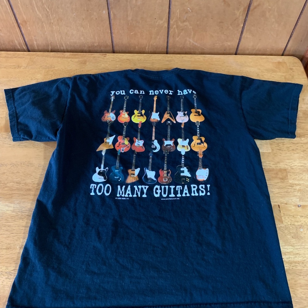 Playin guitar never to many great condition size L